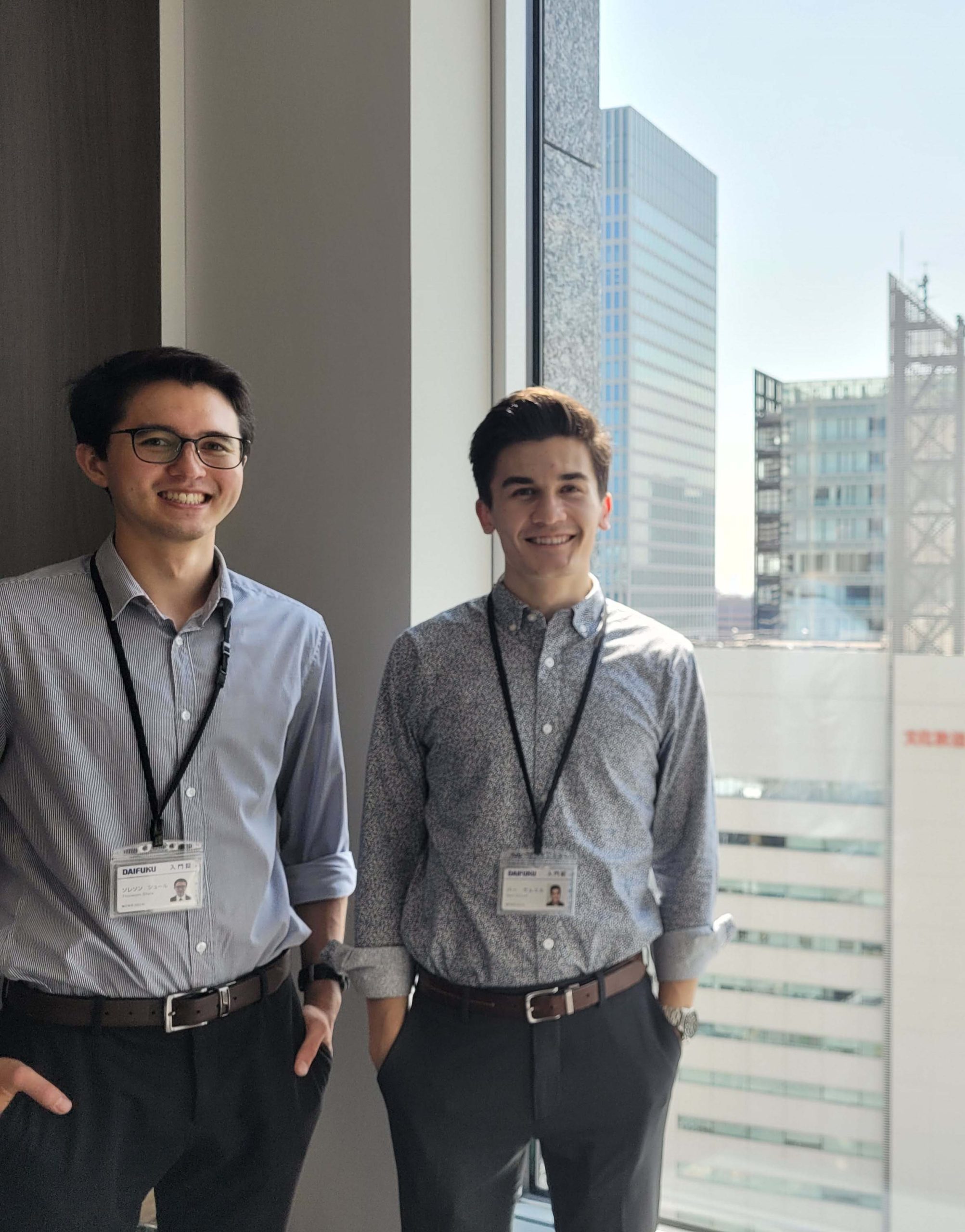 Image of two students in front of camera during their internship in Japan.